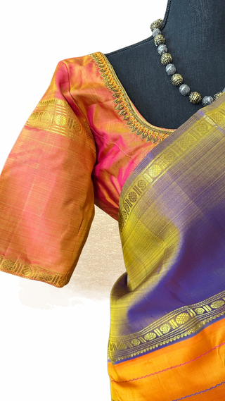 Handwoven yellow Kanjivaram silk saree featuring traditional gold zari pallu and border.