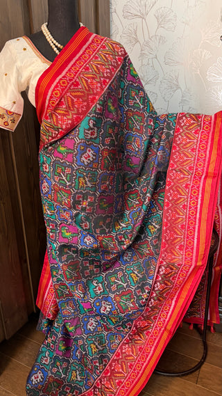 High quality red patan patola handloom saree with fine silk texture