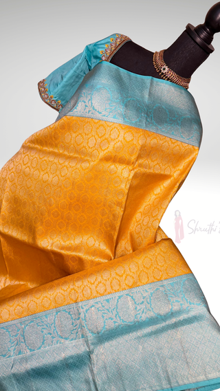 Brocade kanjivaram yellow gold zari with stitched blouse traditional kanchi pattusaree saree Indian wedding