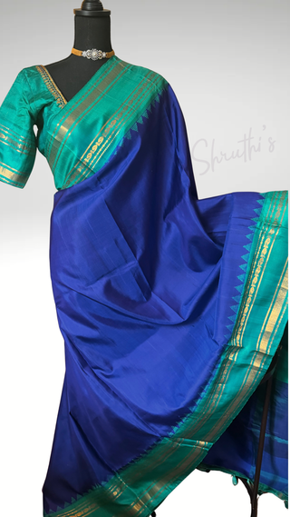 Finest weave of the softest drape our blue on sea green Gadwal silk saree with embroidered stitched blouse