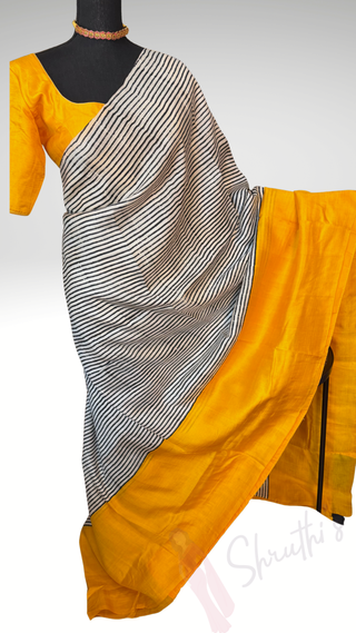 Yellow handloom Tussar silk with stitched blouse stripe saree