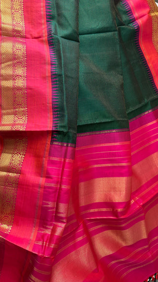 Handcrafted bottle green pink double tone silk saree with gold zari border