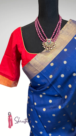 Pure Kora organza partywear saree in royal blue with woven golden motifs.