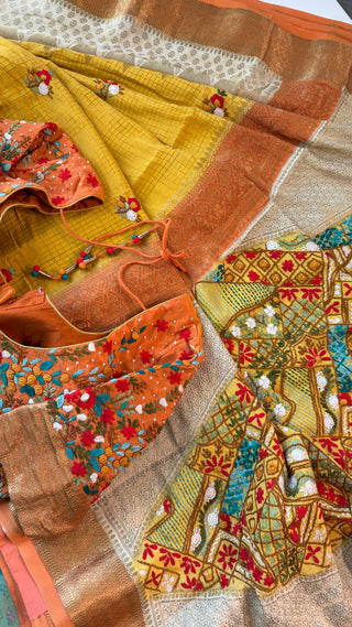 Mustard crepe silk saree designed with traditional Pichwai inspired motifs