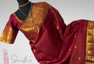 Kanjivaram silk saree with traditional muthu kattam checks design in deep maroon