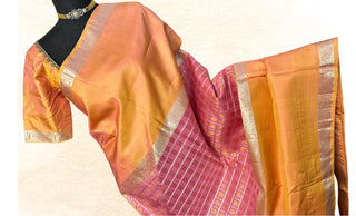 Soft pastel Kanchi pattu saree with silver gold zari and stitched blouse