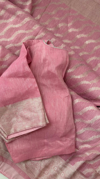 Soft pastel pink Banarasi linen saree with prestitched blouse and finished pico fall, ideal for festive and formal Indian wear.