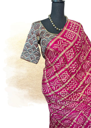 Pink Bandhani pure silk saree with Ajrakh printed pallu and prestitched padded blouse.