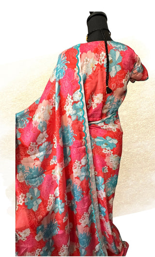 Pink satin silk printed saree with hand-embroidered scallop edging and matching prestitched blouse.