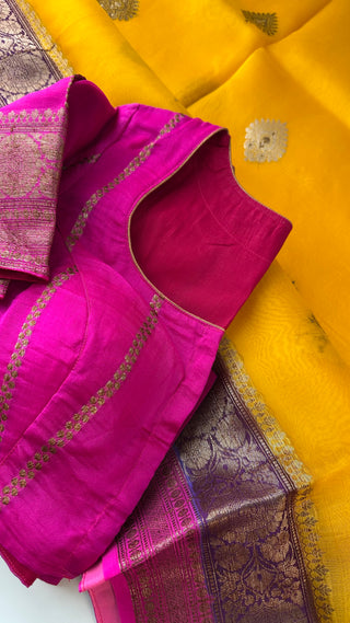 Handcrafted organza silk saree in soft yellow-pink color with gold zari, ready-to-wear blouse, and lightweight drape.