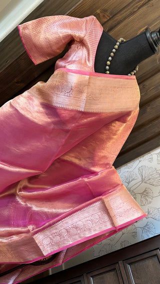 Pastel pink pure double tissue Banarasi silk saree with silver zari and lined stitched blouse, ideal for weddings and festive occasions.