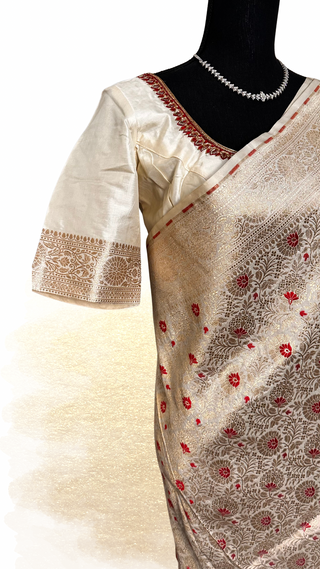 White Banarasi Katan silk saree with silver and gold zari border and stitched blouse