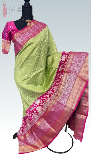 Elegant Bandhej Patola pure silk saree in apple green to pink ombré shade with embroidered stitched blouse, ideal for party and pooja wear.