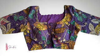 Violet Kalamkari blouse with floral hand-painted motifs, perfect for pairing with sarees.