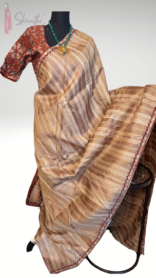 Gold body pure handloom tussar silk saree featuring cutwork kalamkari embroidered border with pre-stitched blouse for bridal and festive wear