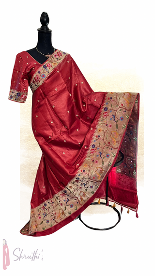 Pure handloom Tussar silk saree in rich maroon featuring Paithani-inspired thread border and silver thread pallu design