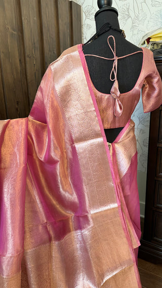 Elegant pastel pink organza tissue Banarasi silk saree with silver zari detailing, stitched blouse, and free USA shipping.