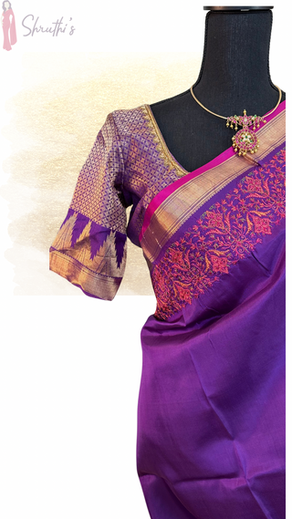 Elegant pure purple silk saree with rich golden embroidery and prestitched blouse, ideal for weddings and festive occasions