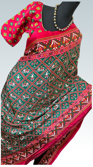 Close-up of ikat printed Gajji silk saree showing fine satin sheen