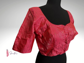Elegant pink pure silk readymade blouse with scoop neckline and elbow-length sleeves, lined and padded for comfort.