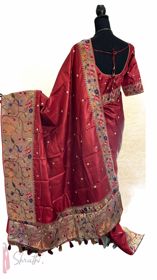 Pure Tussar silk saree adorned with Paithani-style pallu, handcrafted silver thread details, and fine handloom texture