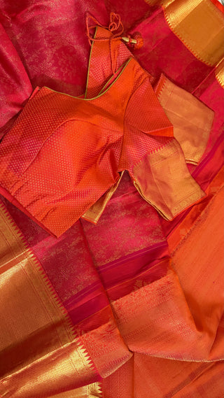 Pure zari handwoven Kanchipuram silk saree in red orange shade