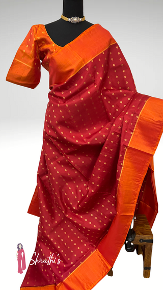 Red kanjivaram silk saree USA sale Indian bride saree with pure zari.
Handwoven red bridal kanjivaram silk saree USA ready-to-wear blouse online.
