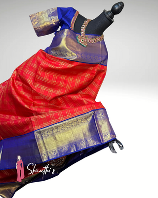 Handwoven Red Checks Kanjivaram Silk Saree with Pure Zari Border and Ready-to-Wear Embroidered Blouse Displayed on a Mannequin