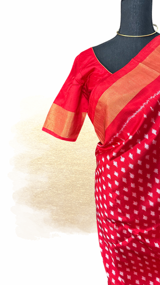 Red pure ikat silk saree with prestitched blouse and zari border