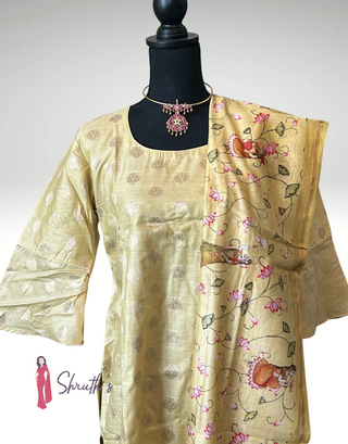 Sandal Chanderi silk cotton salwar suit USA, lotus print dupatta salwar suit USA, handwoven Chanderi salwar kameez online USA, traditional Indian salwar suit USA, floral dupatta salwar set USA shipping, beige gold silk salwar kameez for pooja USA, Indian festive salwar suits for women USA, elegant ethnic outfit with lotus design USA, temple wear salwar suit USA, zari woven kurta salwar USA, pastel lotus print dupatta suit USA, Indian ethnic salwar kameez boutique USA, shop designer Chanderi suits USA online