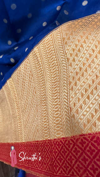 Lightweight organza silk saree with rich zari weaving for festive wear.
