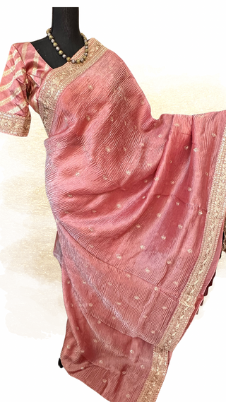Elegant pastel tissue silk saree with stitched blouse and embroidery border