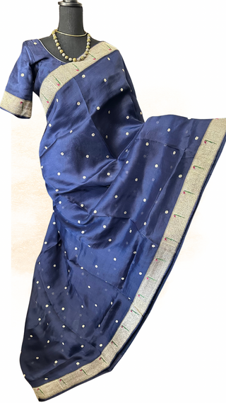 Organza silk saree in blue with silver zari borders and stitched blouse