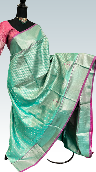 Tissue turquoise green Venkatagiri pure silk saree with silver zari border and contrast blouse