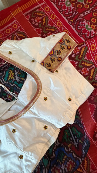 Red patan patola pure silk saree featuring intricate animal pattern craftsmanship