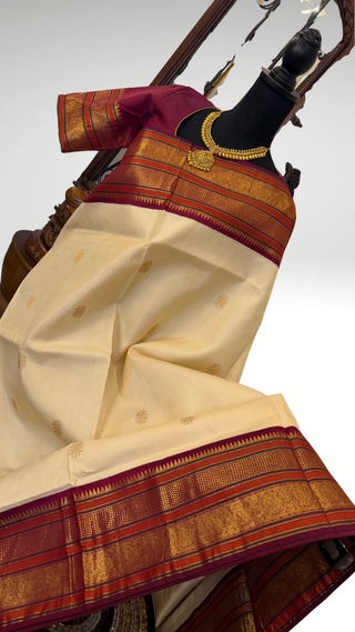 Handloom cream Kanjivaram silk saree with red zari border and lined padded stitched blouse for pellicheera, mehandi, reception and pooja wear