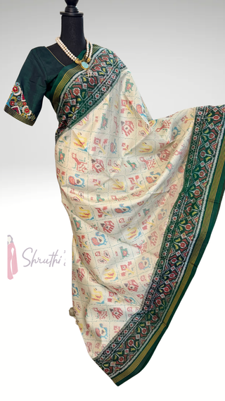 Traditional Patan Patola silk saree in green shade with fine weave and easy drape finish