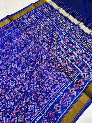 Traditional indigo blue patola silk saree with beautiful woven border