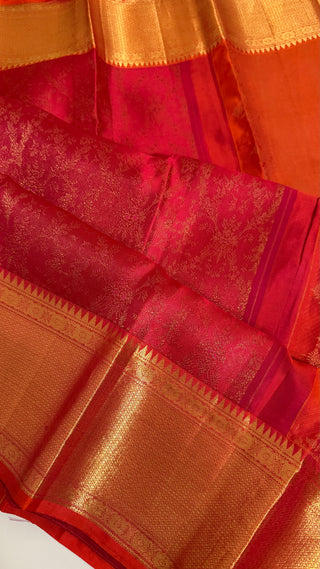 Traditional red Kanchipuram silk saree with heavy golden pallu design