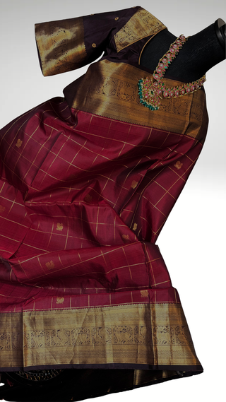 Elegant deep maroon silk saree with traditional kattam checks pattern