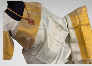 South Indian bridal pellicheera saree in gold beige Kanchi silk, silver gold zari border, handwoven saree with prestitched blouse.