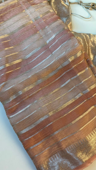 Traditional handwoven Banarasi saree in pink tissue silk with rich zari border and stitched blouse.