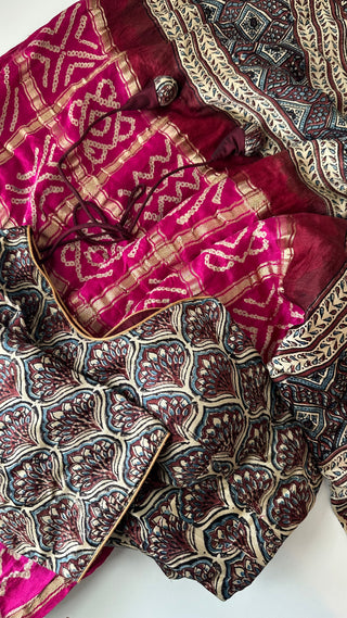 Bandhini pink silk saree with designer Ajrakh blouse, prestitched for easy wear.