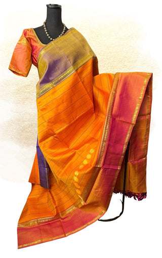 Elegant South Indian pure silk Kanchipuram saree in yellow with stitched blouse.