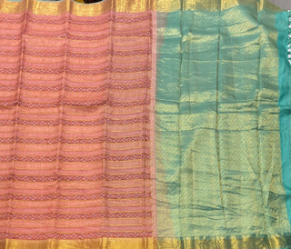 Traditional handwoven Kanchi Pattu saree with rich zari pallu and stitched blouse