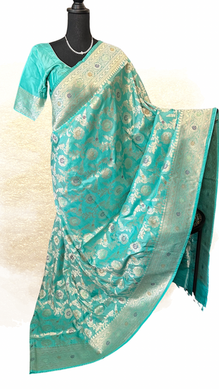 Turquoise sea green Benerasi Katan silk saree with silver zari detailing