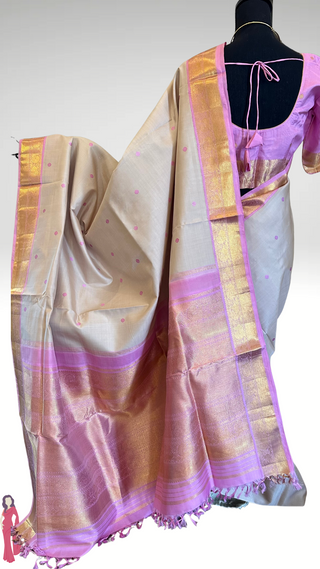 Authentic handwoven Ven Pattu Kanchipuram silk saree with silver zari detailing, pastel tones, and prestitched blouse for Indian wedding wear.