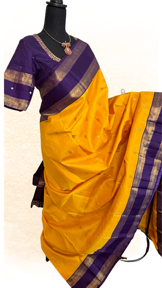 Handloom vintage yellow Kanjivaram pure silk saree with gold zari weave purple border and embroidered blouse