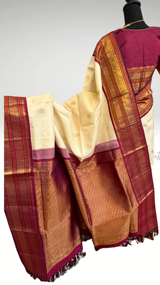 White cream Kanjivaram handloom silk saree with gold zari border and ready stitched blouse ideal for muhurtam kalyana pattu and partywear