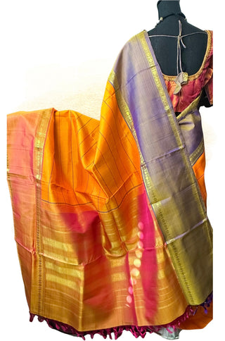 Yellow Kanchi pattu saree with fine zari detailing, perfect for weddings and festivals.